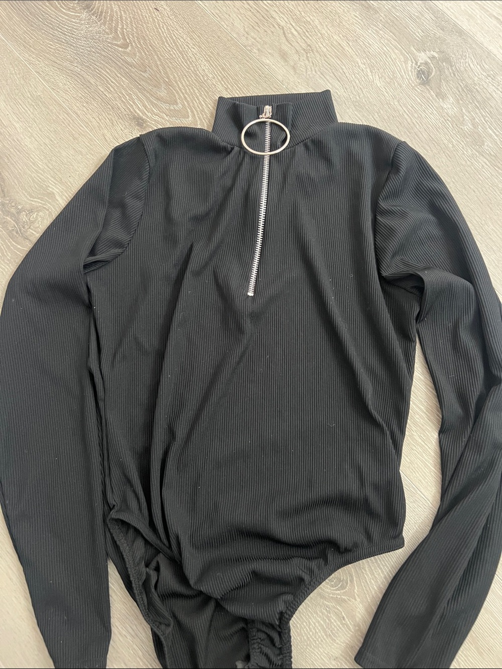 Never worn Boohoo Black Ribbed Long-Sleeve Zip Bodysuit with Ring Pull